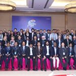 Group Photo at ALP Group Global Meet featuring Vijay Malhotra with Top Management