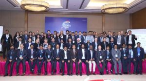 Group Photo at ALP Group Global Meet featuring Vijay Malhotra with Top Management